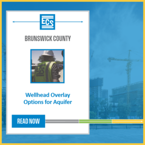 Graphic: Blue background with white floating box on top. Within the box are the ECS logo at the top followed by "Brunswick County," a photo of the backside of an ECS employee wearing an ECS logo, and "Wellhead Overlay Options for Aquifer" before a "read more" prompt.